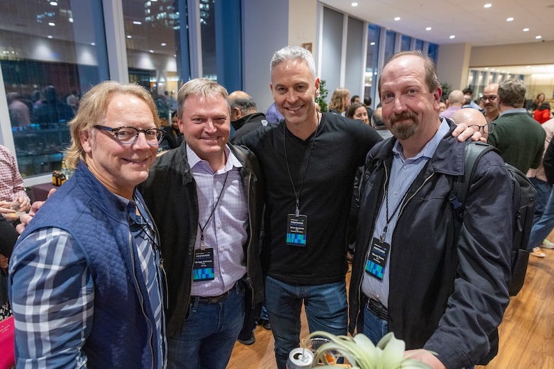 Firsthand Summit 2024 - Group of four attendees networking